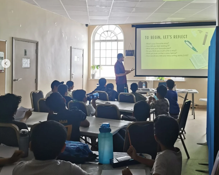 Umair delivering workshop - reflection session